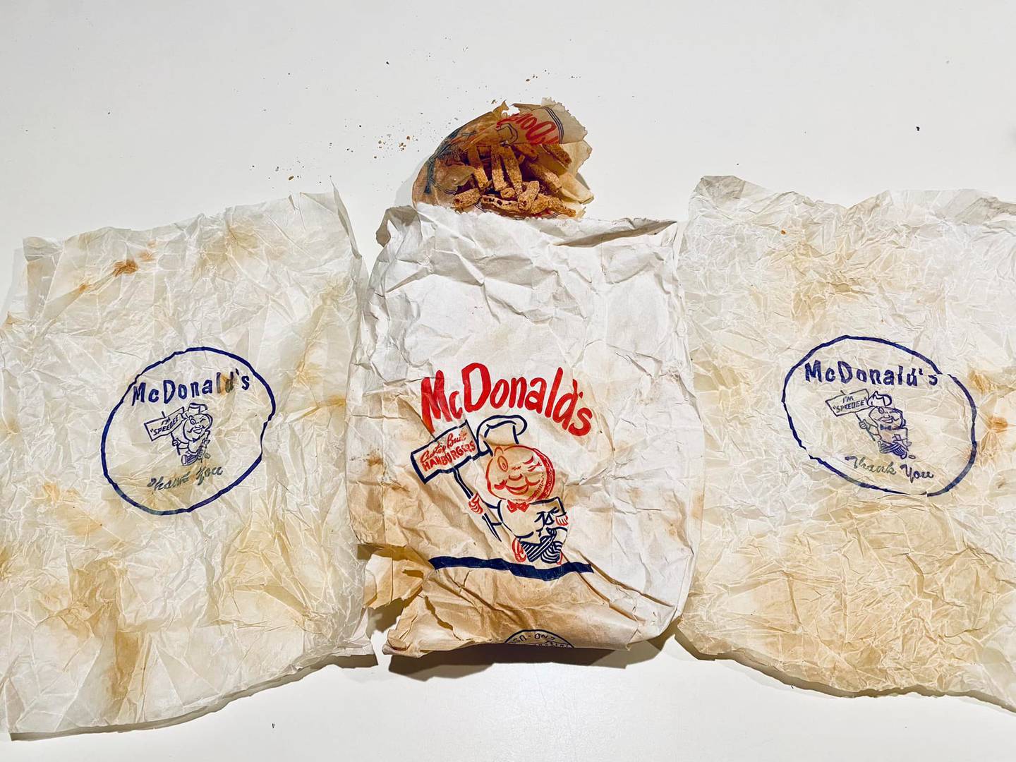 The remains of a McDonald's meal that is at least 60 years old, found inside the walls of the home of Rob and Grace Jones of Crystal Lake on April 19, 2022, while they were renovating their bathroom.