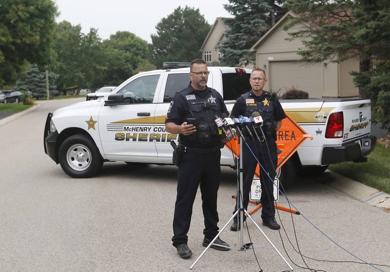 Tim Creighton, from the McHenry County Sheriff's office, (left) and Chief of Operations Mike Muraskey give an update on a domestic incident in which four people were killed on Wednesday Aug. 9, 2023, in the 5800 block of Wild Plum Road in unincorporated Crystal Lake. Police later said they were family members.