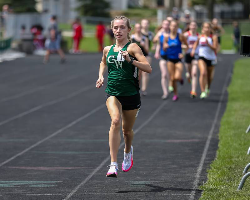 Glenbard West's Audrey Allman finishes first in heat 3 of the 800 meter run at the Glenbard West's Sue Pariseau Girls Track and Field Invitational.  April 23.2022.