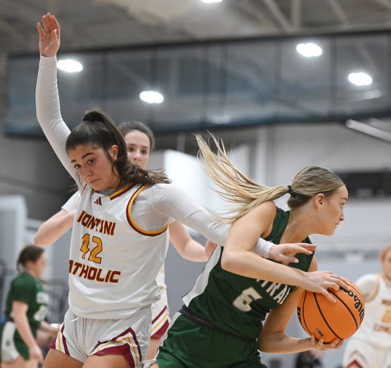 Grayslake Central's Katelyn Marcelain, right, tries get around Montini's Natalie Gartlan during the Hersey Class 3A supersectional on Monday, March 3, 2025 in Arlington Heights.