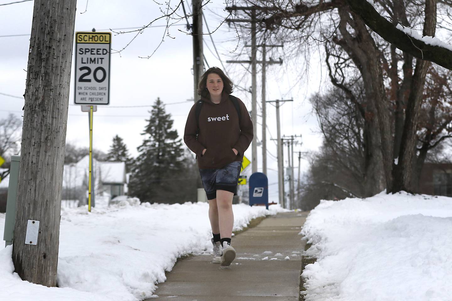Lucas Iversen, a junior at Woodstock High School, walks home from school alongSouth Street in Woodstock Friday, March 10, 2023.  Woodstock had one of the highest snow totals from the winter storm that rolled through Thursday afternoon into Friday morning, according to the National Weather Service in Romeoville.
Snow totals throughout northern Illinois ranged from a half-inch reported in Batavia to 9.6 inches in Bull Valley, NWS Meteorologist Zachary Yack said.