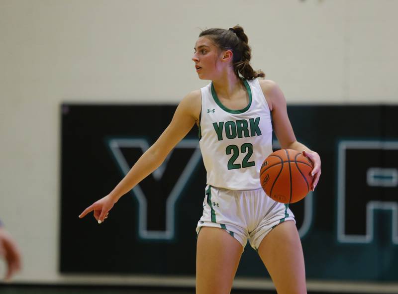 York's Stella Kohl (22) directs traffic during the girls varsity basketball game between Lyons Township and York high schools on Friday, Dec. 16, 2022 in Elmhurst, IL.