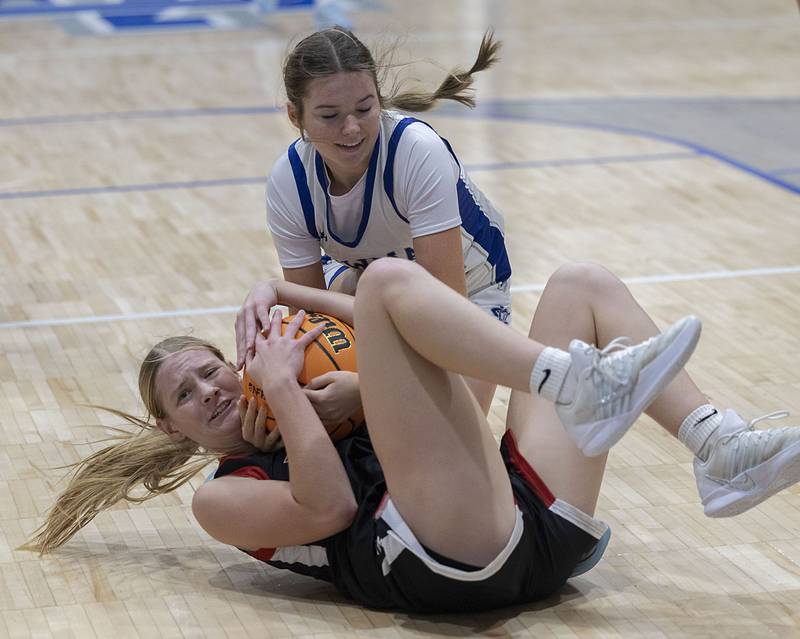 Fulton’s Haley Smither and Newman’s Grace King battle for the ball Tuesday, Nov. 25, 2025.