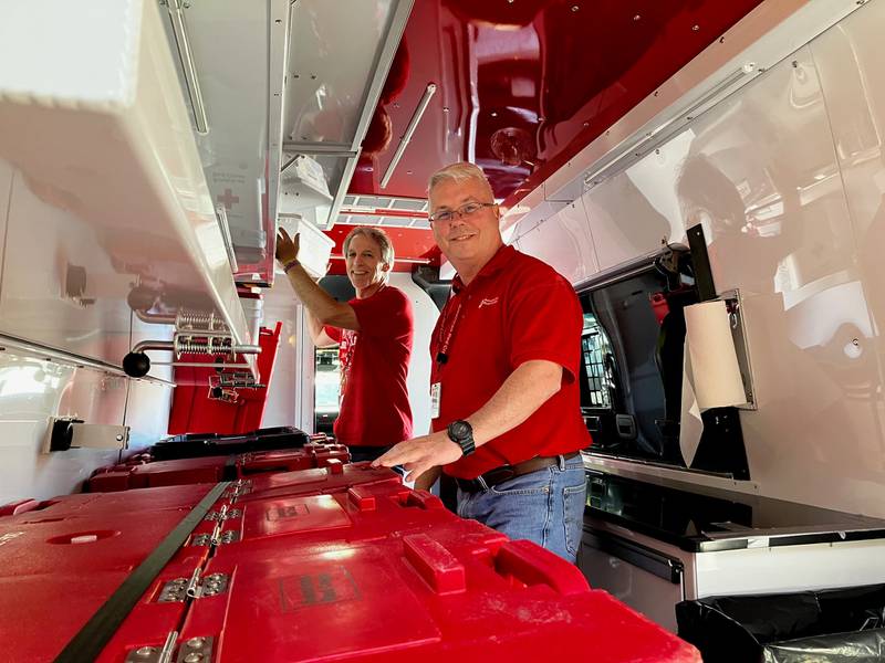 Volunteer Chuck Massaro (back) with Brian McDaniel, executive director, Red Cross of the Illinois River Valley Chapter, drove an emergency response vehicle to Florida. They, along with more than 80 Red Cross emergency response vehicles, have been delivering hot meals on a daily basis to people in need following Hurricane Ian.
