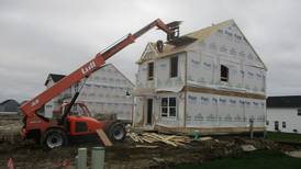 Pritzker’s affordable housing plan gets Senate hearing as municipalities remain opposed