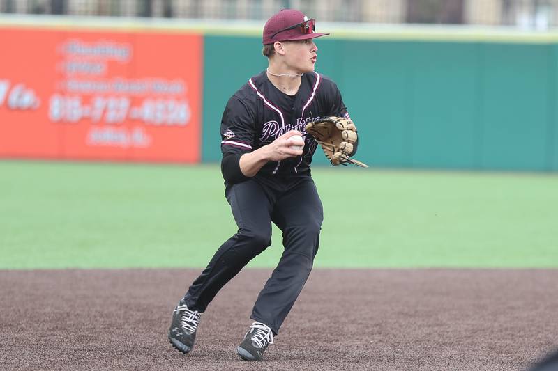 Lockport’s Brendan Mecher looks to throw to first base against Joliet West in the WJOL Don Ladas Memorial baseball tournament championship game on Saturday, April 4, 2026 in Joliet.
