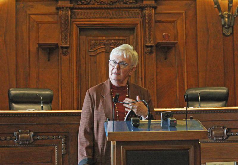 Illinois Supreme Court Chief Justice Mary Jane Theis speaks to the crowd at an opening ceremony for the court's new learning center. The interactive facility, located in the Supreme Court building in Springfield, allows visitors to judge historic cases and learn about the history of state courts.