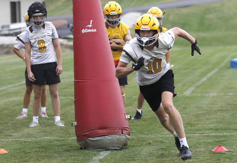 Jacobs’ Carson Goehring runs a pass pattern during football practice on Tuesday, August 15, 2025, at Jacobs High School in Algonquin.