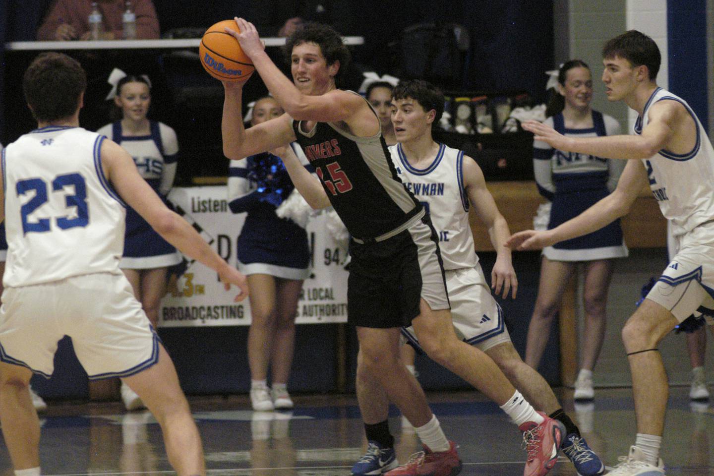 Erie-Prophetstown 's Gus Schultz pulls down a rebound.. The Newman Comets hosted the Erie-Prophetstown Panthers in a Conference game. The game was played at Newman High School on February 6, 2026.