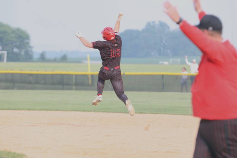Benet's Merrick Sullivan jumps in celebration after hitting a go ahead home run against Burlington Central at the Class 3A Kaneland Sectional Semi Final on Thursday, June 5, 2025 in Maple Park.