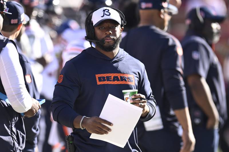 Chicago Bears interim head coach Thomas Brown watches from the sideline during the first half of an NFL football game against the San Francisco 49ers in Santa Clara, Calif., Sunday, Dec. 8, 2024. (AP Photo/Eakin Howard)