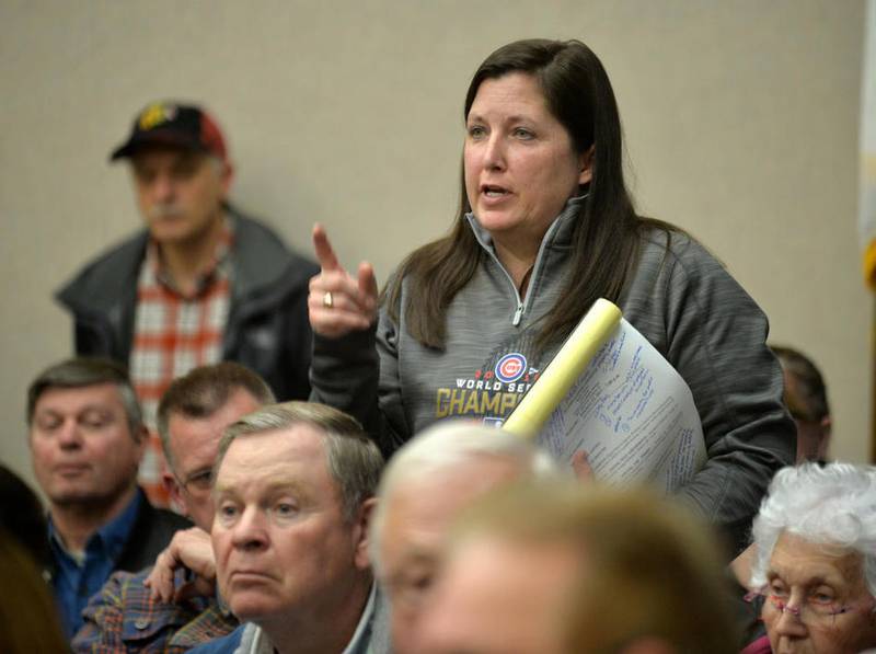 South Grove Township resident Ann Carlson asks a question during a DeKalb County Planning and Zoning Board meeting Wednesday in Sycamore.