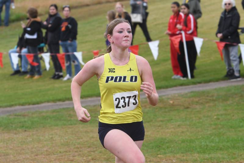 Polo'-Forreston's Aubrey Herndon sprints to the finish line at  the Amboy Columbus Day Cross Country Invitational held at Shady Oaks Country Club near Amboy on Monday, Oct. 13, 2025.
