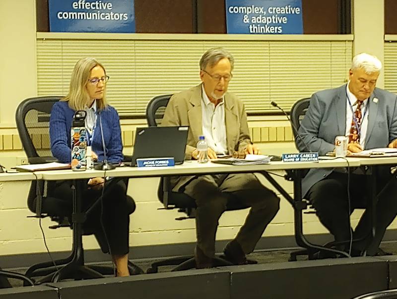 Geneva District 304 board member Jackie Forbes, Board President Larry Cabeen and Superintendent Kent Mutchler at Monday’s school board meeting. The board accepted a $10,150 gift from an anonymous donor for Project Lead the Way, an honors-level Science, Technology, Engineering, and Mathematics program.