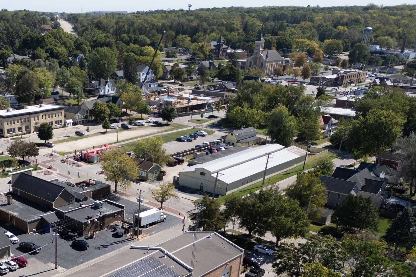 A shuttered lumberyard in East Dundee could be transformed into a mixed-use development featuring townhouses, apartments, boutique lodging, retail space and a performing arts center.