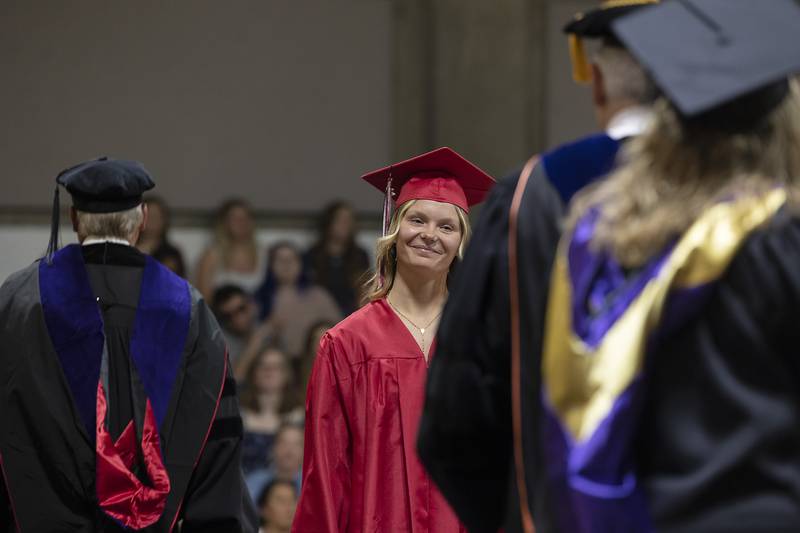 SVCC graduate Mickayla Bass smiles as she crosses the stage Friday, May 9, 2025, to receive her diploma during commencement.