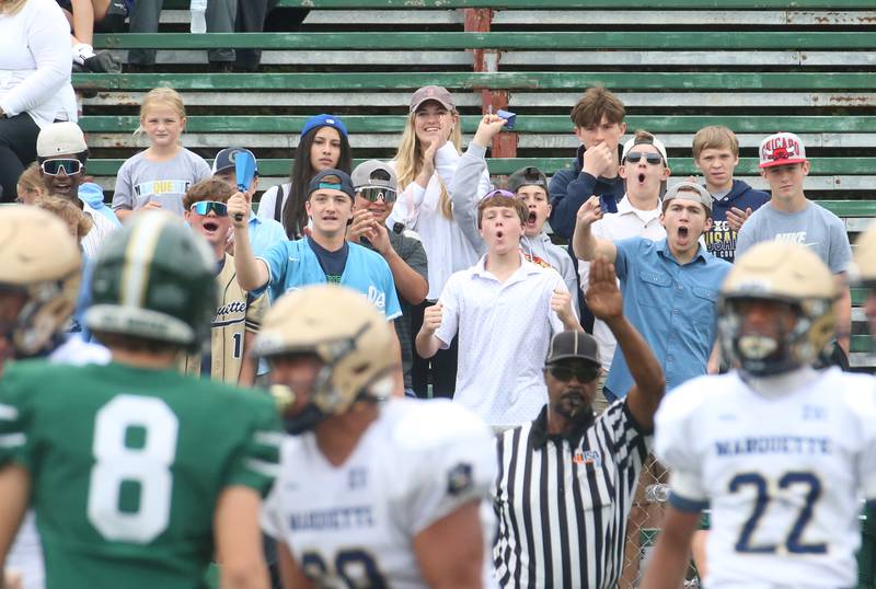 The Marquette student section celebrates after the team scored a touchdown against St. Bede on Saturday, Sept. 28, 2024 at St. Bede Academy.