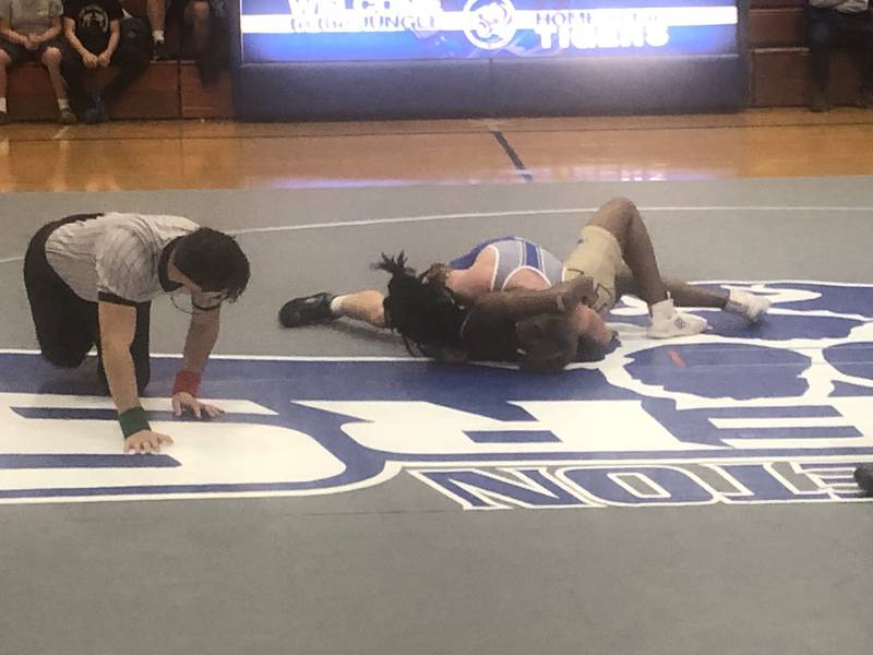 Princeton's Casey Etheridge works on a pin against Morris Tuesday night at Prouty Gym.