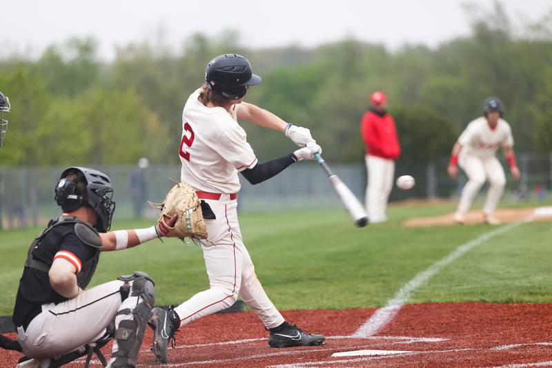 Lincoln-Way Central’s Jack Novak connects for a 2 run double against Lincoln-Way West on Monday, May 8, 2023 in New Lenox.