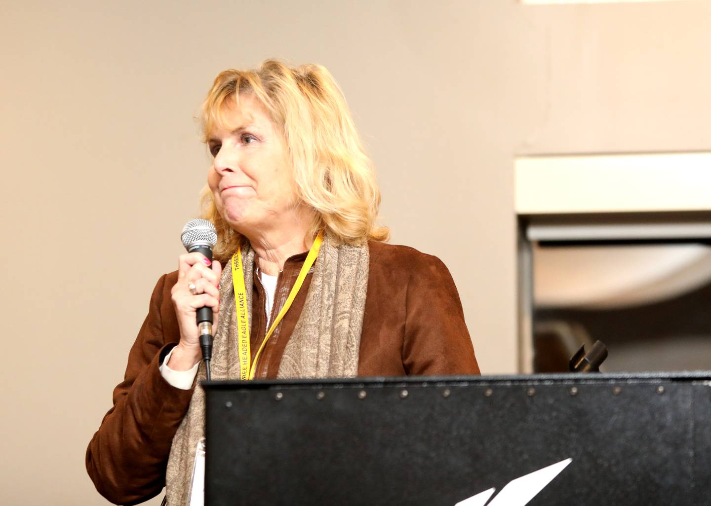 Debbie Kanarowski, founder and vice chairwoman of the Three Headed Eagle Alliance, addresses members and guests during the group’s monthly Pints and Politics program at Eagle Brook Country Club in Geneva on Tuesday, Nov. 14, 2023.