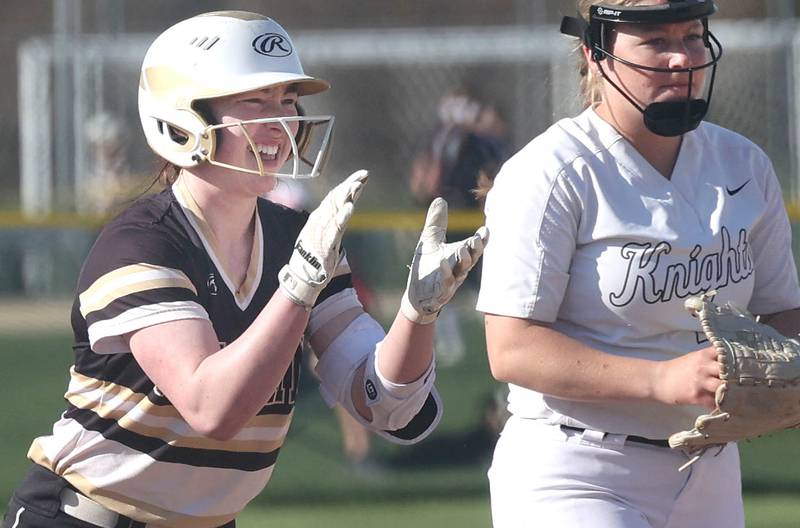 Sycamore's Tia Durst celebrates after getting to third Friday, April 28, 2023, during their game against Kaneland at Sycamore High School.