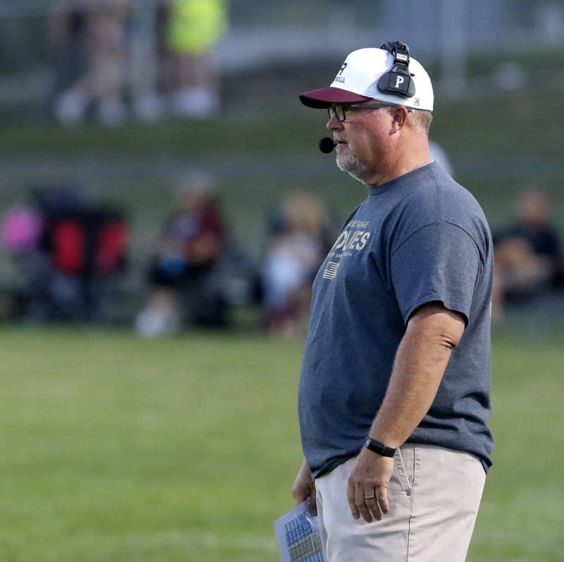 Prairie Ridge coach Chris Schremp watches his team play during a Fox Valley Conference football game against Crystal Lake South Friday, Sept. 1, 2023, at Prairie Ridge High School inCrystal Lake.