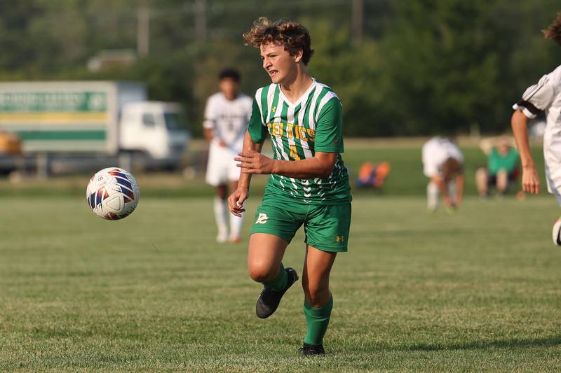 Providence’s JT Potocsnak runs down the ball against Joliet Catholic on Aug. 21, 2023 in New Lenox.