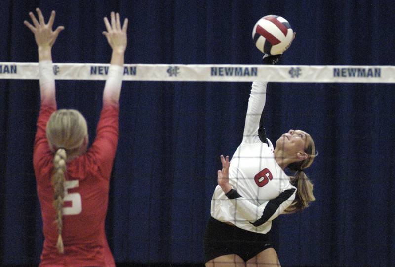 E-P's Avery Olinger hits a ball past Oregon's  Skylar Bishop. Erie-Prophetstown took on Oregon in the Class 2A regional volleyball semifinal Tuesday, Oct. 29, 2024 at Newman High School.