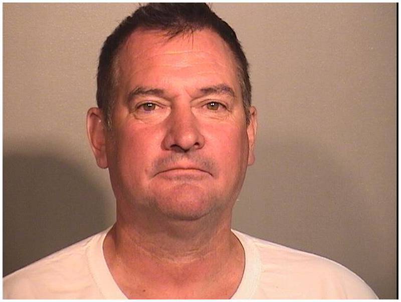 Michael E. Smith, 51, of the 3500 block of Southport Drive, Island Lake