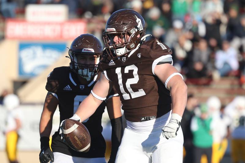 Joliet Catholic’s Isaac Clauson celebrates a fumble recovery against Providence in the Class 5A semifinal on Saturday, Nov. 18, 2023, in Joliet.