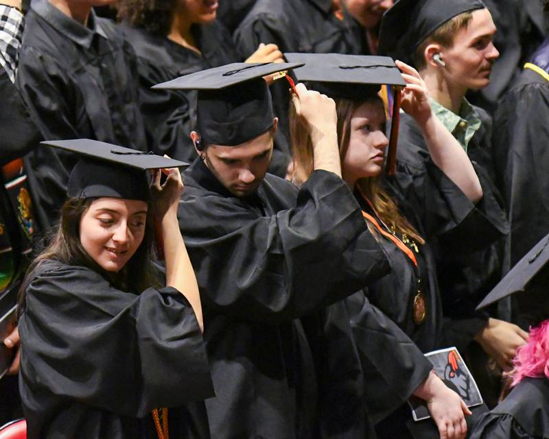 DeKalb High School seniors move their tassels to the right side of their caps signifying they have graduated during the graduation ceremony on Saturday May 23, 2026, held at the Convocation Center in DeKalb.