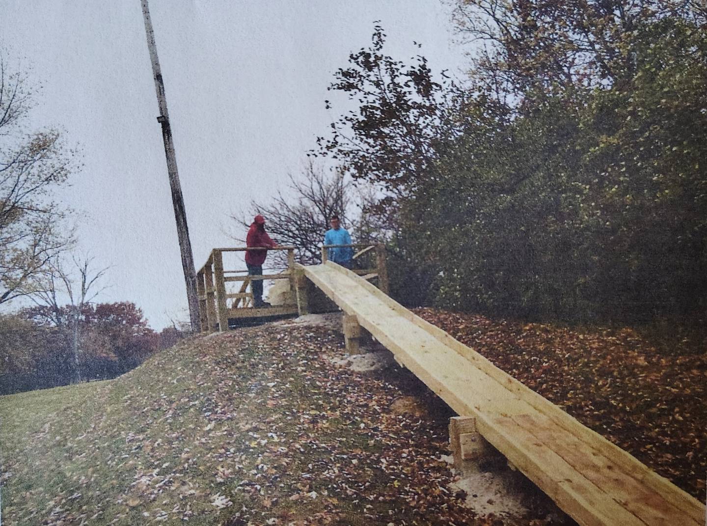 Eagle Scout Michael Cronkrite selected to improve a rundown snow sledding area for kids. The area had an incline ramp from the basin to the top of the sledding hill that was in bad shape and needed to be repaired completely.