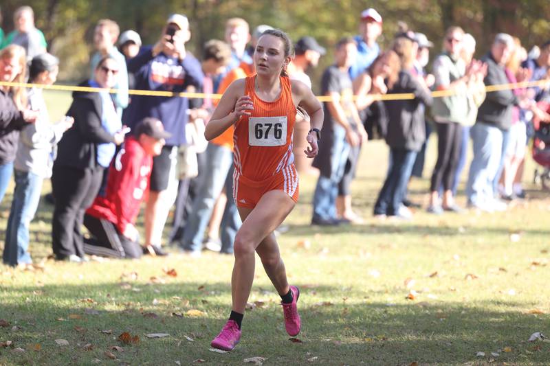 Oswego’s Audrey Sorderlind finishes first uncontested in the Girls Cross Country Class 3A Minooka Regional at Channahon Community Park on Saturday.