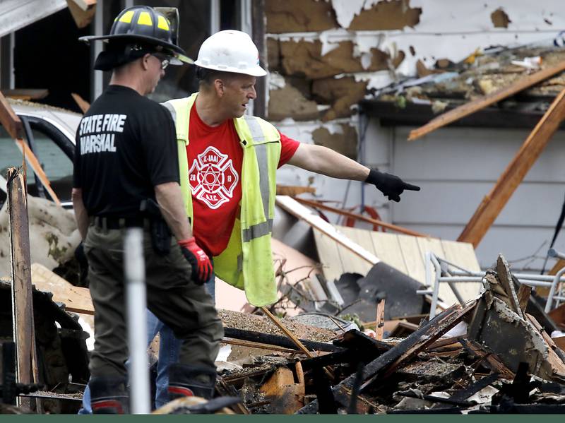 Authorities look for the cause of a home explosion on Monday, May 18, 2026, in 7400 block of Birch Drive, in Wonder Lake, after the Sunday evening explosion. One resident of a home was killed and two others have been taken to the hospital.