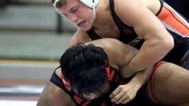 Wrestling notes: McHenry ‘peaking’ heading into the postseason 