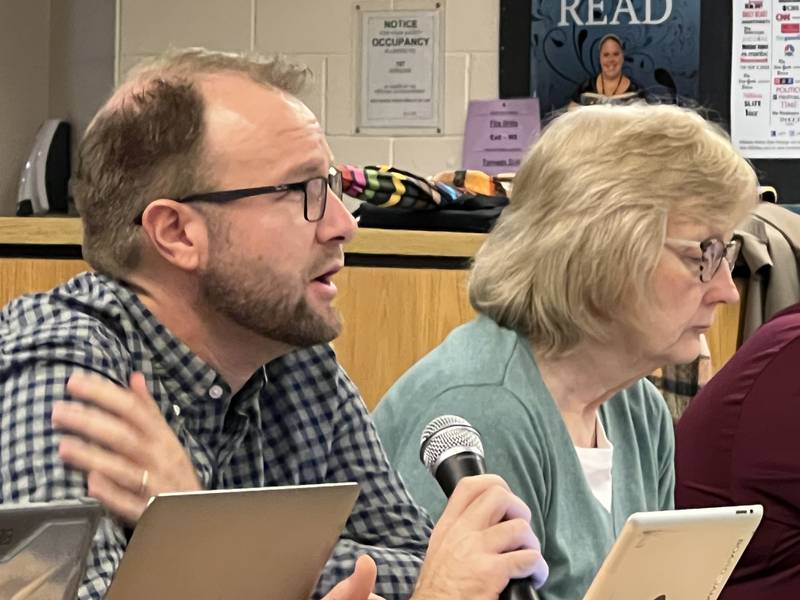 Sycamore Community School District 427 Board of Education member, Julenne Davey sits next to James Chyllo, also a board member, during a board meeting on Oct. 25, 2022.