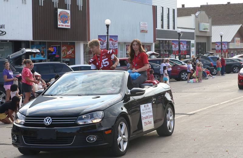 Hall High School freshman attendants Miles Ponce and Bernadette Larsen ride during the Homecoming parade on Thursday, Sept. 18, 2025 downtown Spring Valley.