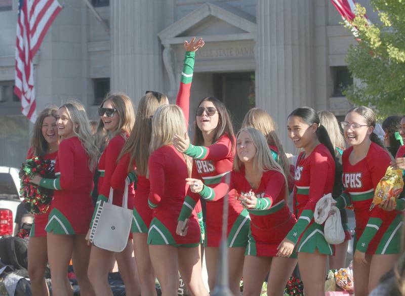 L-P cheerleaders ride on a float during the L-P Homecoming parade on Thursday, Sept. 26, 2024 downtown La Salle.