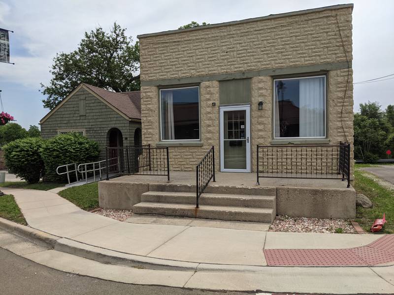 Oswego Library Board trustees Wednesday approved the $330,000 purchase of property at 109 and 111 North River Street, Montgomery.
