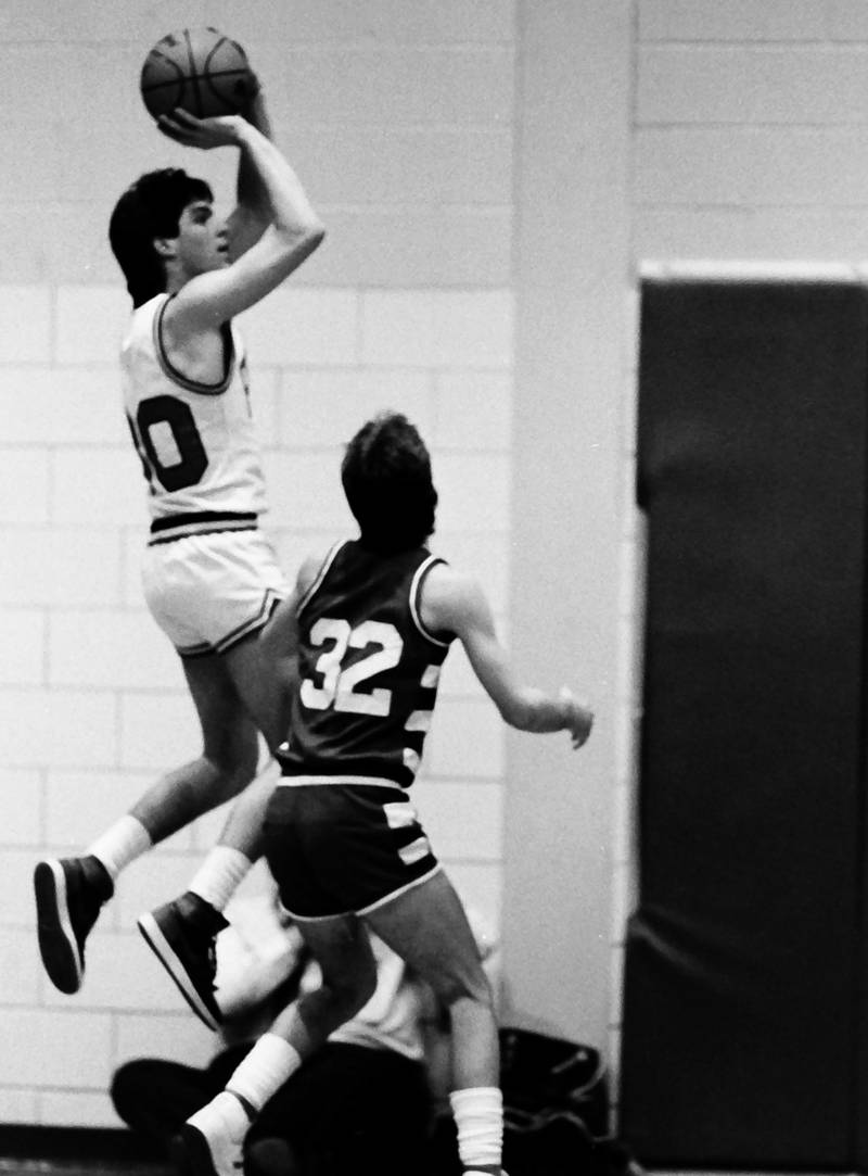 Ottawa's Brent Sonday shoots a jump shot over L-P's John Happ during the Regional title game on Saturday, Feb. 28, 1986 at La Salle-Peru Township High School.