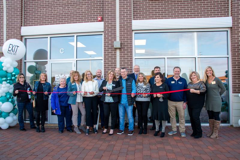 Joanne and Jim Levicki, owners of Exit Realty 365, along with their agents, colleagues, friends, family and staff and the board of the Cary-Grove Area Chamber of Commerce celebrate Exit Realty 365's new office location in Lake Barrington with an official ribbon cutting on Thursday, Nov. 4.