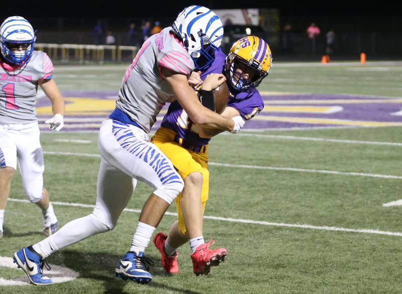 Princeton's Noah LaPorte tackles Mendota's Aden Tilman on Friday, Oct. 11, 2024 at Mendota High School.