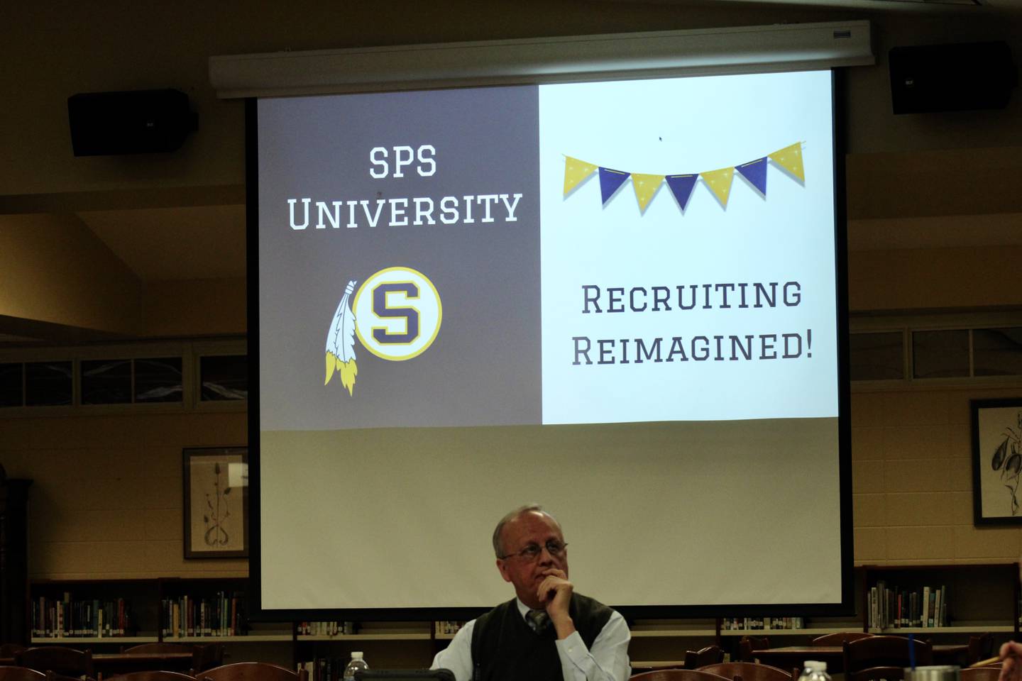 Narcisco Puentes, a member of the Sterling Public Schools board of education, listens to a presentation on SPS University on Wednesday, Jan. 25, 2023, at the Sterling High School library.