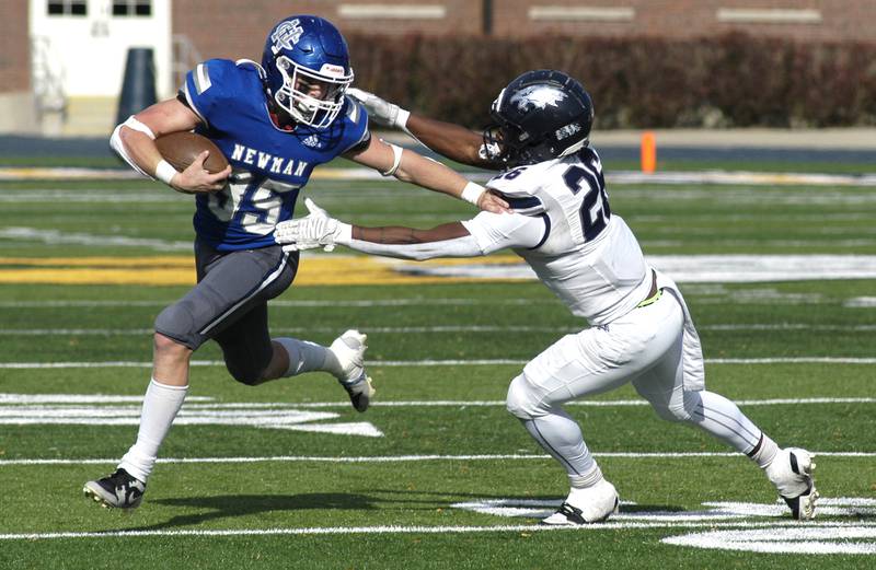 Newman's Daniel Kelly avoids Chicago Hope's Seann Velma-Ruiz. Newman defeated Chicago Hope 50-22 in Class 1A 1st round football at Sterling High School on Saturday, November 2, 2024.
