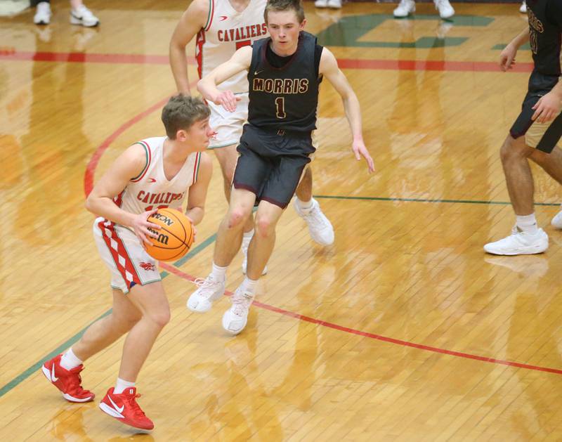 L-P's Kyle Spelich looks to pass the ball against Morris on Monday, Feb. 9, 2026 in Sellett Gymnasium at L-P High School.