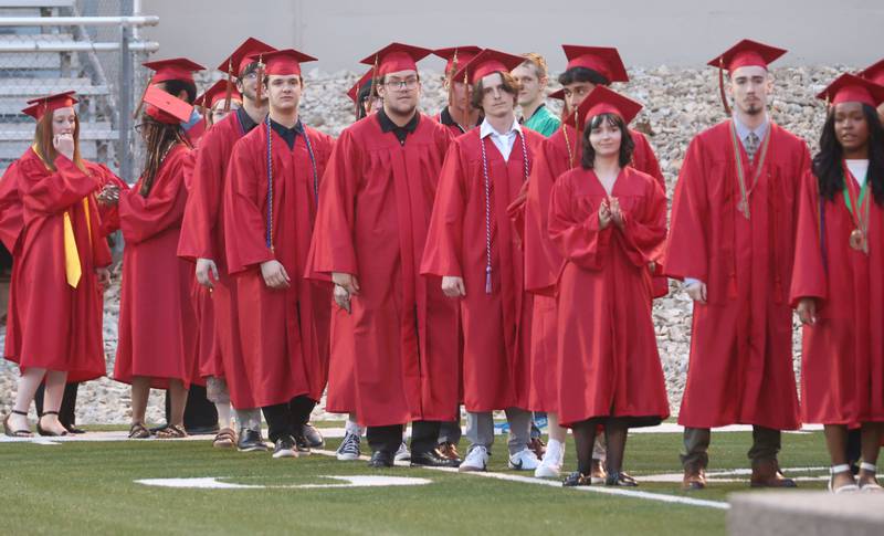 La Salle-Peru Township High School graduates walk to receive their diplomas during the L-P Class of 2026 commencement ceremony on Thursday, May 14, 2026 at Howard Fellows Stadium.