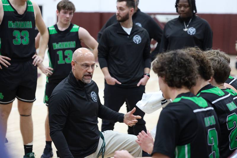 Bishop McNamara head coach Adrian Provost speaks to his players in a timeout during the Fightin' Irish's 62-41 victory over Clifton Central in the Watseka Holiday Tournament championship on Tuesday, Dec. 16, 2025.