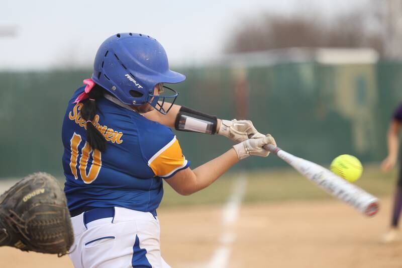 Joliet Central’s Kassie Martinez connects against Wilmington on Tuesday, March 12 in Joliet.