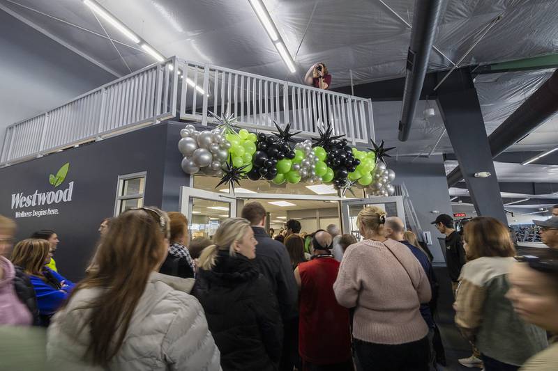 Visitors file into the Westwood Wellness area Tuesday, Jan. 31, 2023 after a ribbon cutting officially opened facility. The center has health, recovery and relaxation amenities.