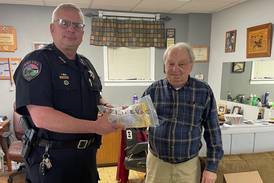 Elburn businessmen donate life-saving equipment to police department
